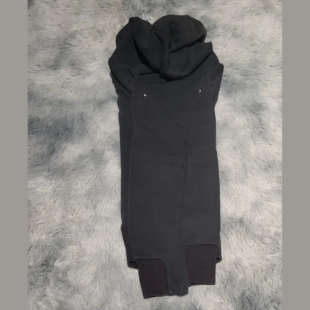 Pantalon de jogging noir, marque non visible, taille non indiquée. Fripes Sélect