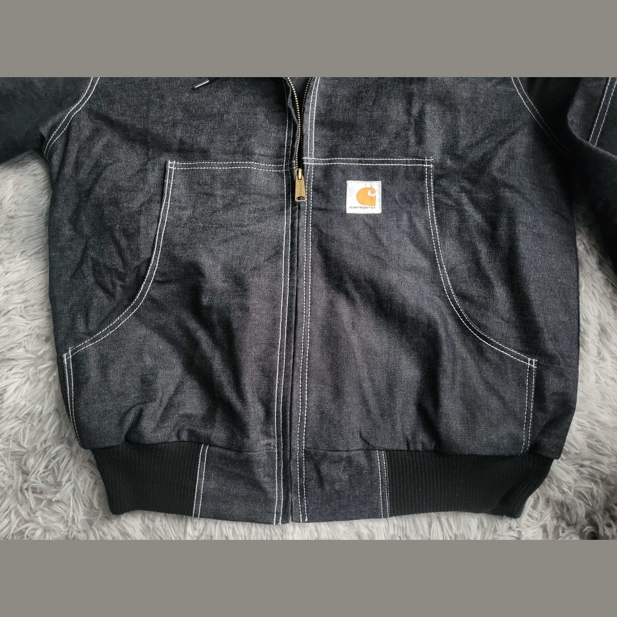 Veste Carhartt noire en denim, taille non indiquée, Fripes Sélect